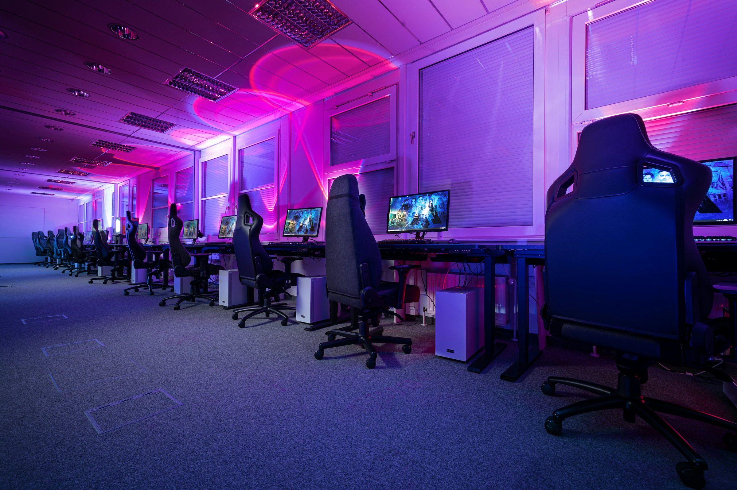 Gaming team playing together A gaming team playing together at their stations
