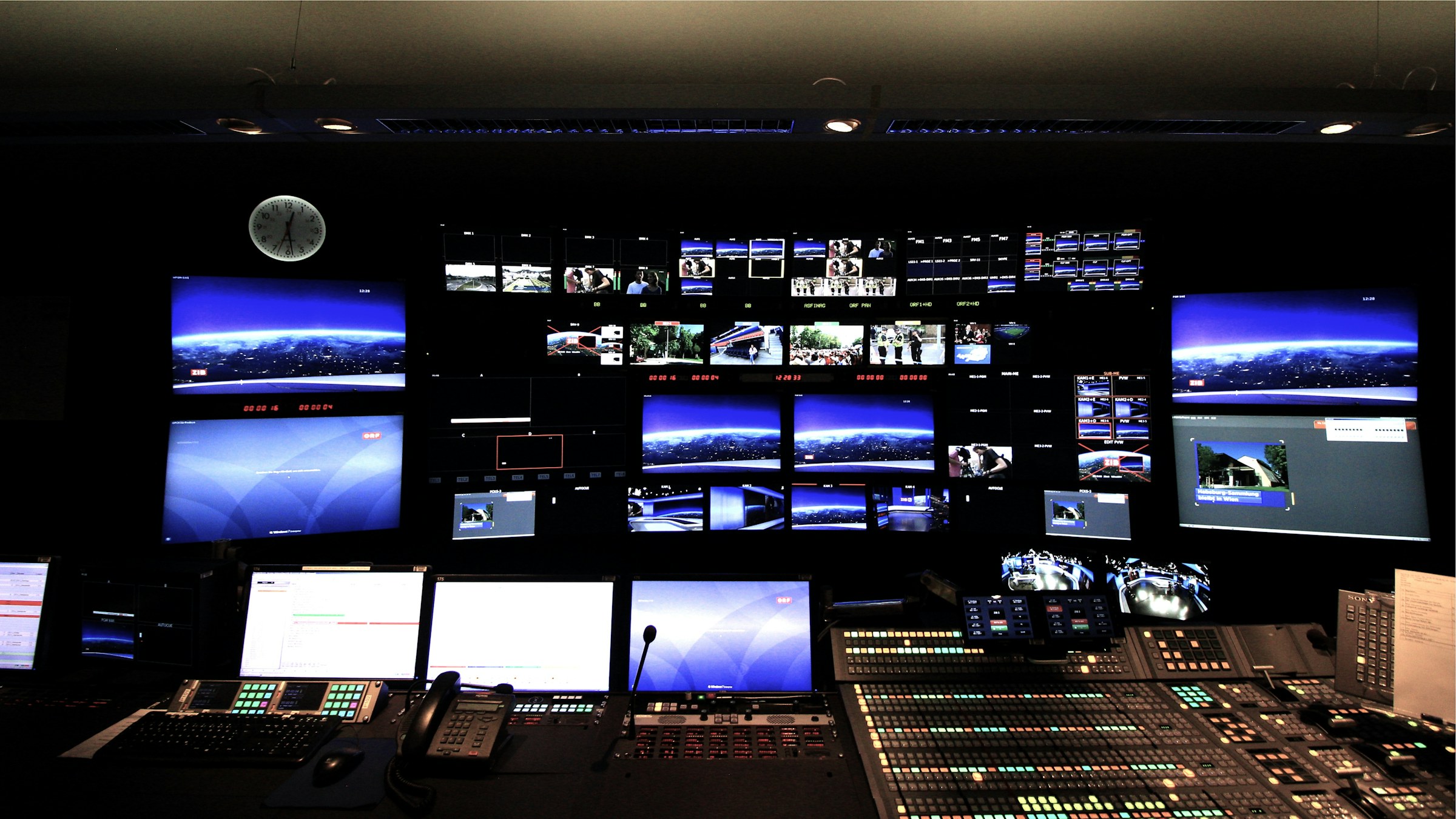 Broadcast control room with a video wall of monitors