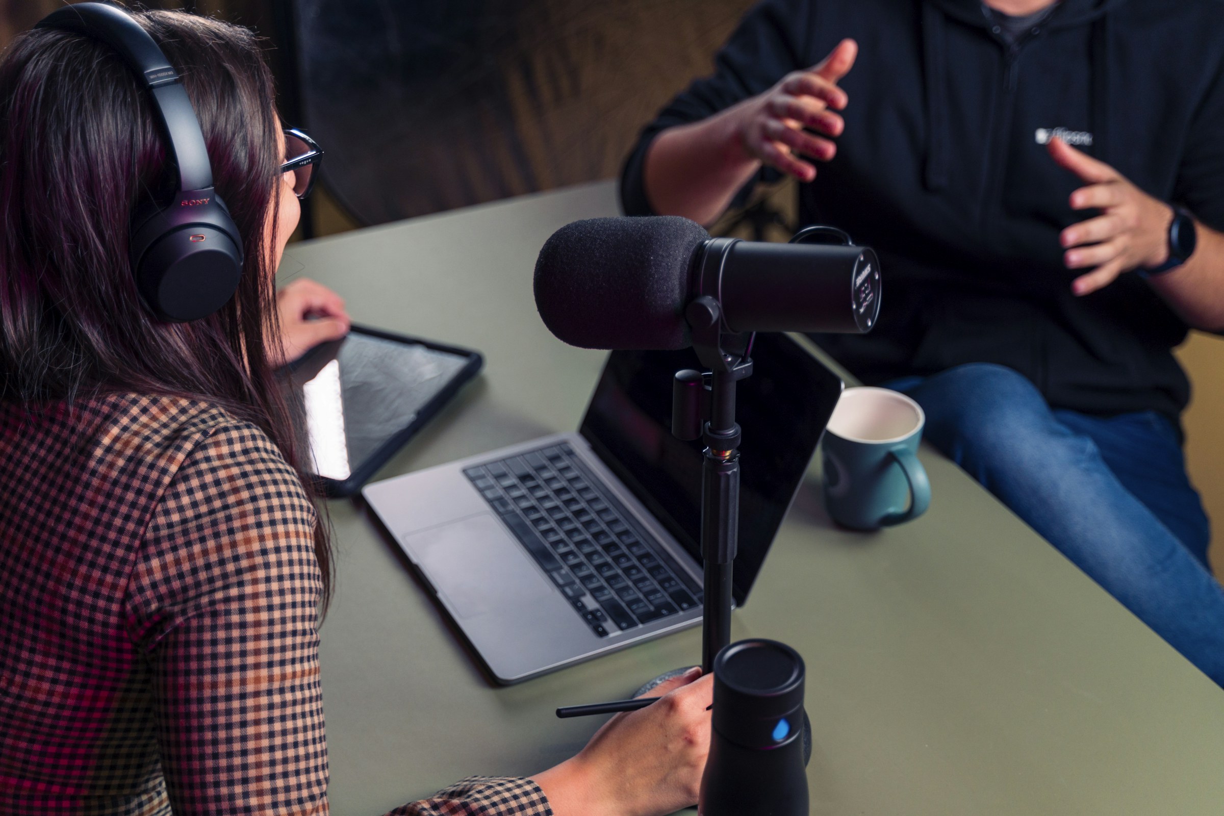 Creators recording a podcast episode Creators recording a podcast episode